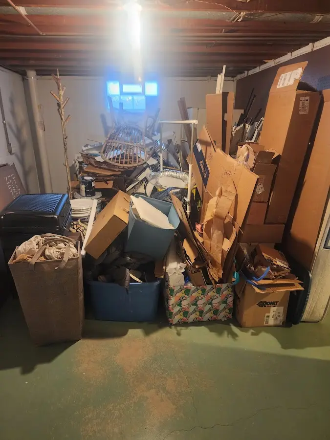 Roll-off dumpster container at job site for 8 Yard Dumpster Rental in Laurel